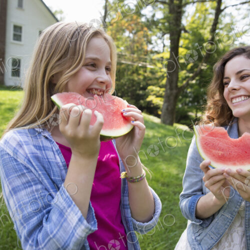 A family summer gathering at a farm. A shared meal, a homecoming. A family summer gathering at a farm. A shared meal, a homecoming.