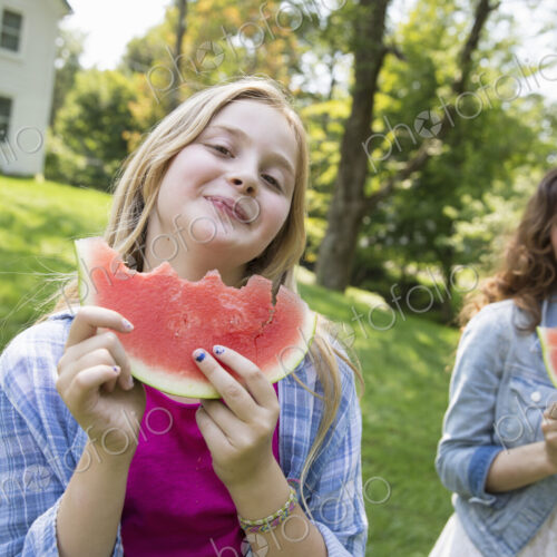 A family summer gathering at a farm. A shared meal, a homecoming. A family summer gathering at a farm. A shared meal, a homecoming.