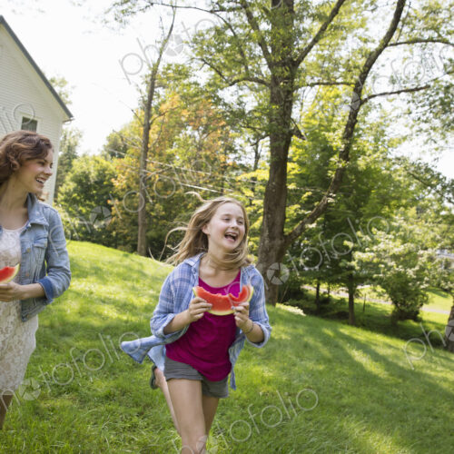 A family summer gathering at a farm. A shared meal, a homecoming. A family summer gathering at a farm. A shared meal, a homecoming.