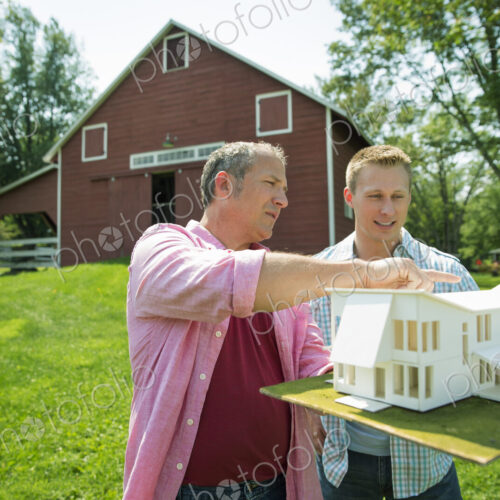 A family summer gathering at a farm. A shared meal, a homecoming. A family summer gathering at a farm. A shared meal, a homecoming.