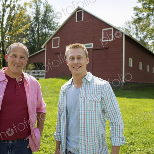 A family summer gathering at a farm. A shared meal, a homecoming. A family summer gathering at a farm. A shared meal, a homecoming.