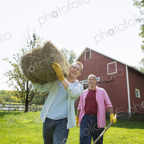 A family summer gathering at a farm. A shared meal, a homecoming. A family summer gathering at a farm. A shared meal, a homecoming.