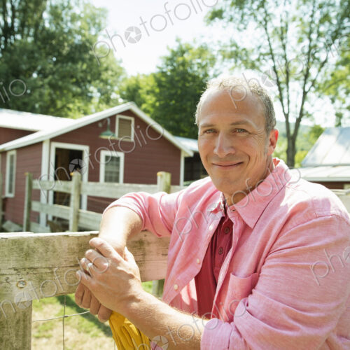 A family summer gathering at a farm. A shared meal, a homecoming. A family summer gathering at a farm. A shared meal, a homecoming.