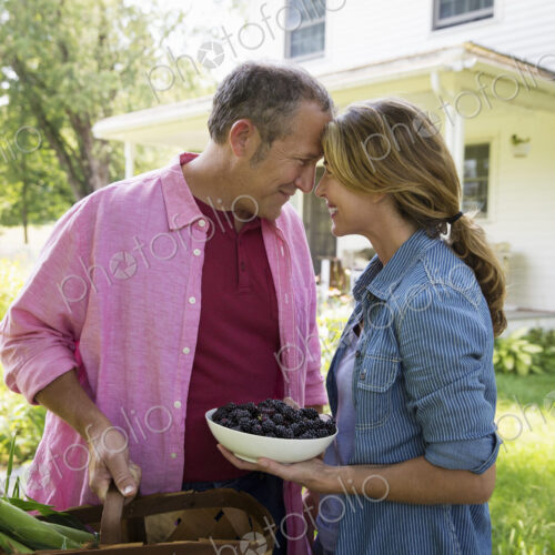 A family summer gathering at a farm. A shared meal, a homecoming. A family summer gathering at a farm. A shared meal, a homecoming.