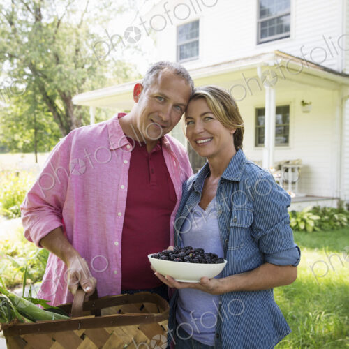A family summer gathering at a farm. A shared meal, a homecoming. A family summer gathering at a farm. A shared meal, a homecoming.