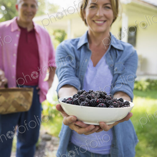 A family summer gathering at a farm. A shared meal, a homecoming. A family summer gathering at a farm. A shared meal, a homecoming.