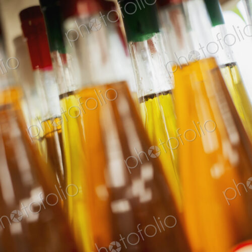 A farm stand. Bottles of vinegar. A farm stand. Bottles of vinegar.