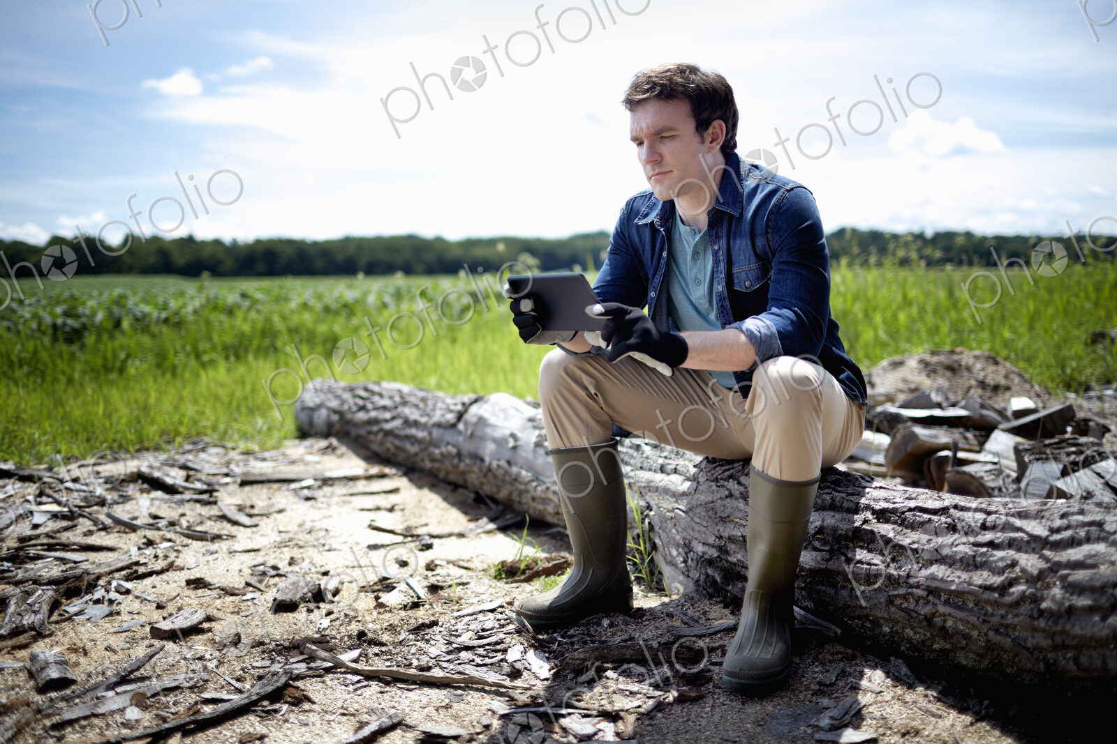 A farmer working in his fields in New York State, USA.