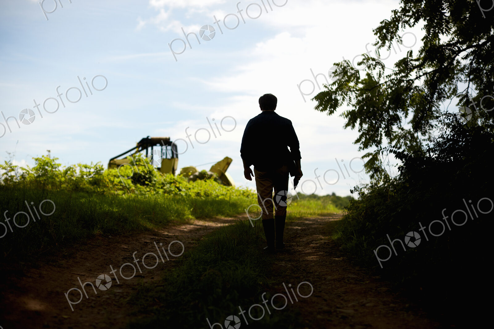 A farmer working in his fields in New York State, USA.