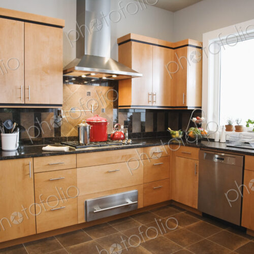 A fitted kitchen interior in a home. A fitted kitchen interior in a home.