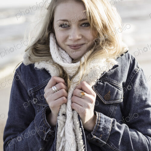 A girl on a beach in winter A girl on a beach in winter