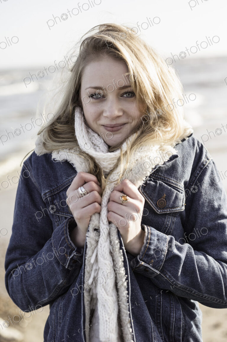A girl on a beach in winter