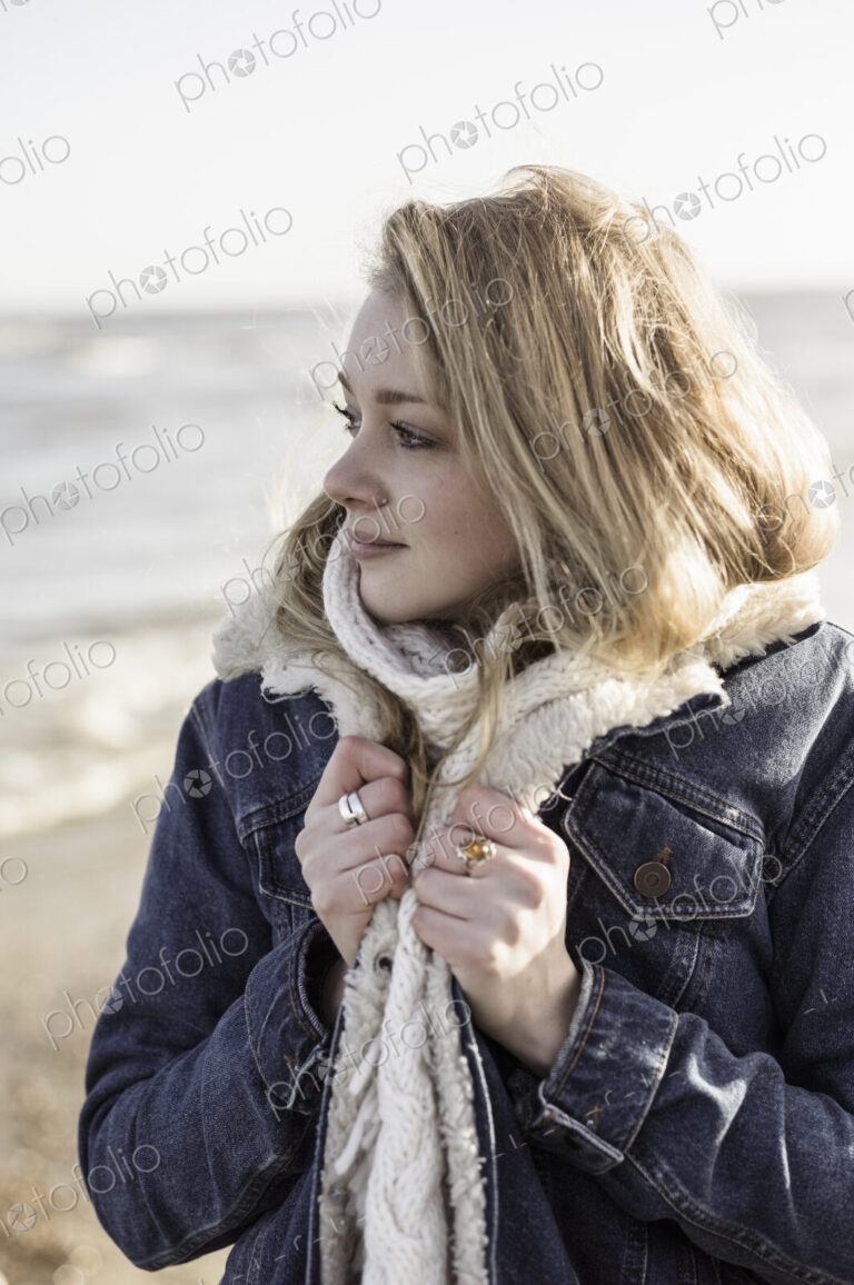 A girl on a beach in winter