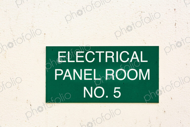 A green sign on a wall, Electrical Panel Room No. 5