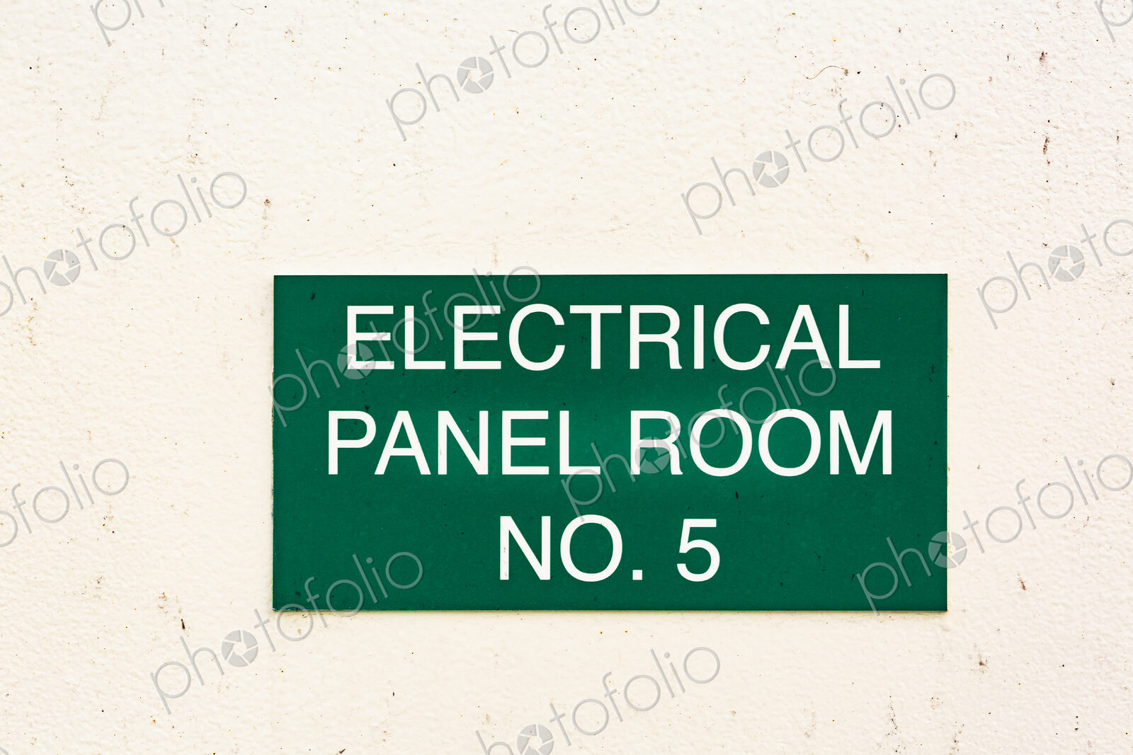 A green sign on a wall, Electrical Panel Room No. 5