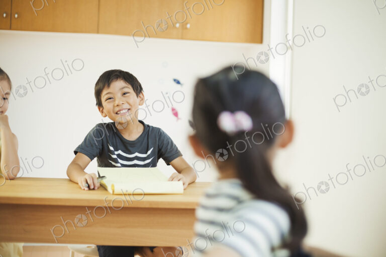 A group of children in a classroom.