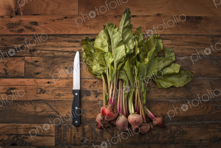 A handful of small beets, fresh organic vegetables harvested for the table. A…