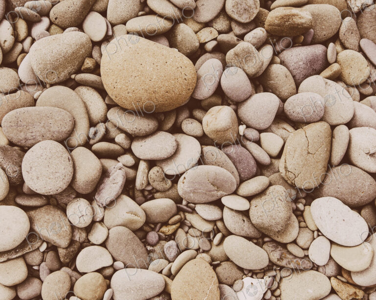 A heap of polished pebbles and small flat stones in Olympic national park.