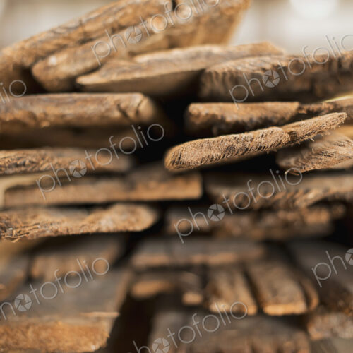 A heap of recycled reclaimed timber planks of wood. Environmentally responsible…