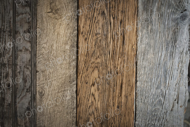 A heap of recycled reclaimed timber planks of wood. Environmentally responsible…