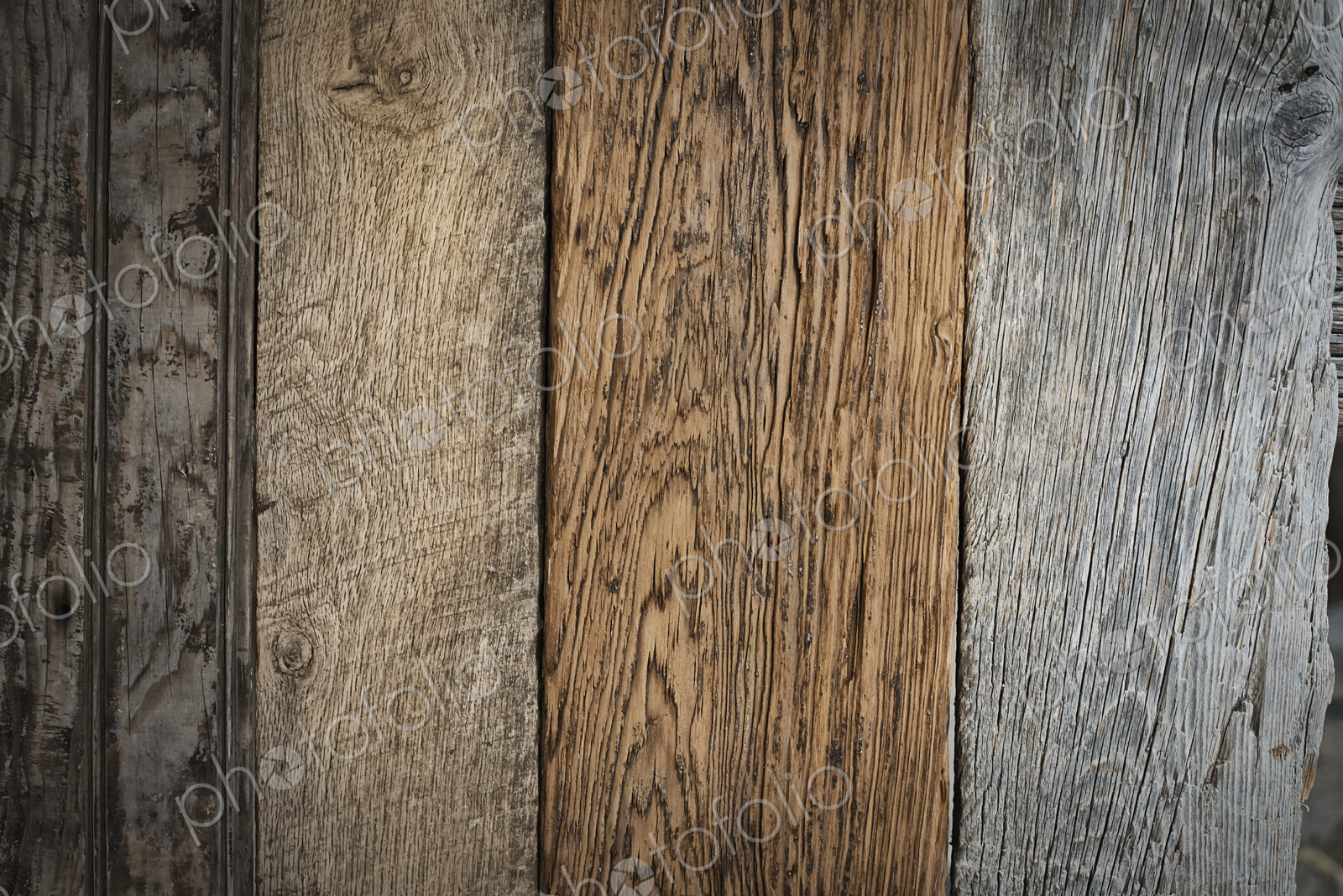 A heap of recycled reclaimed timber planks of wood. Environmentally responsible…