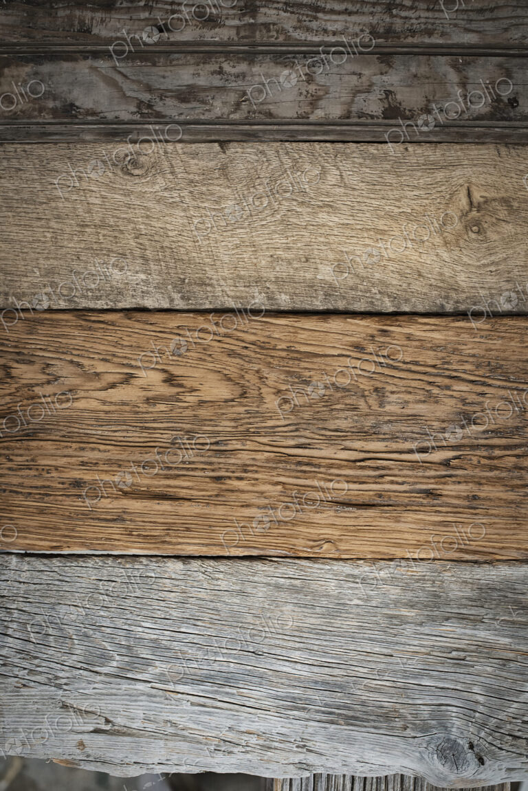 A heap of recycled reclaimed timber planks of wood. Environmentally responsible…