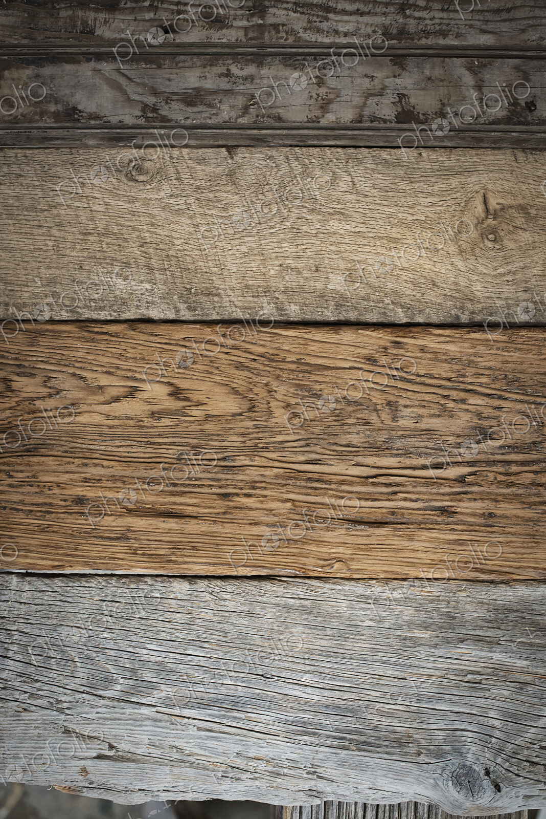A heap of recycled reclaimed timber planks of wood. Environmentally responsible…