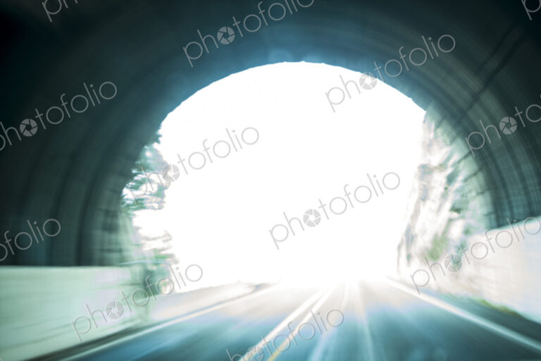 A highway tunnel entry into bright light, Washington