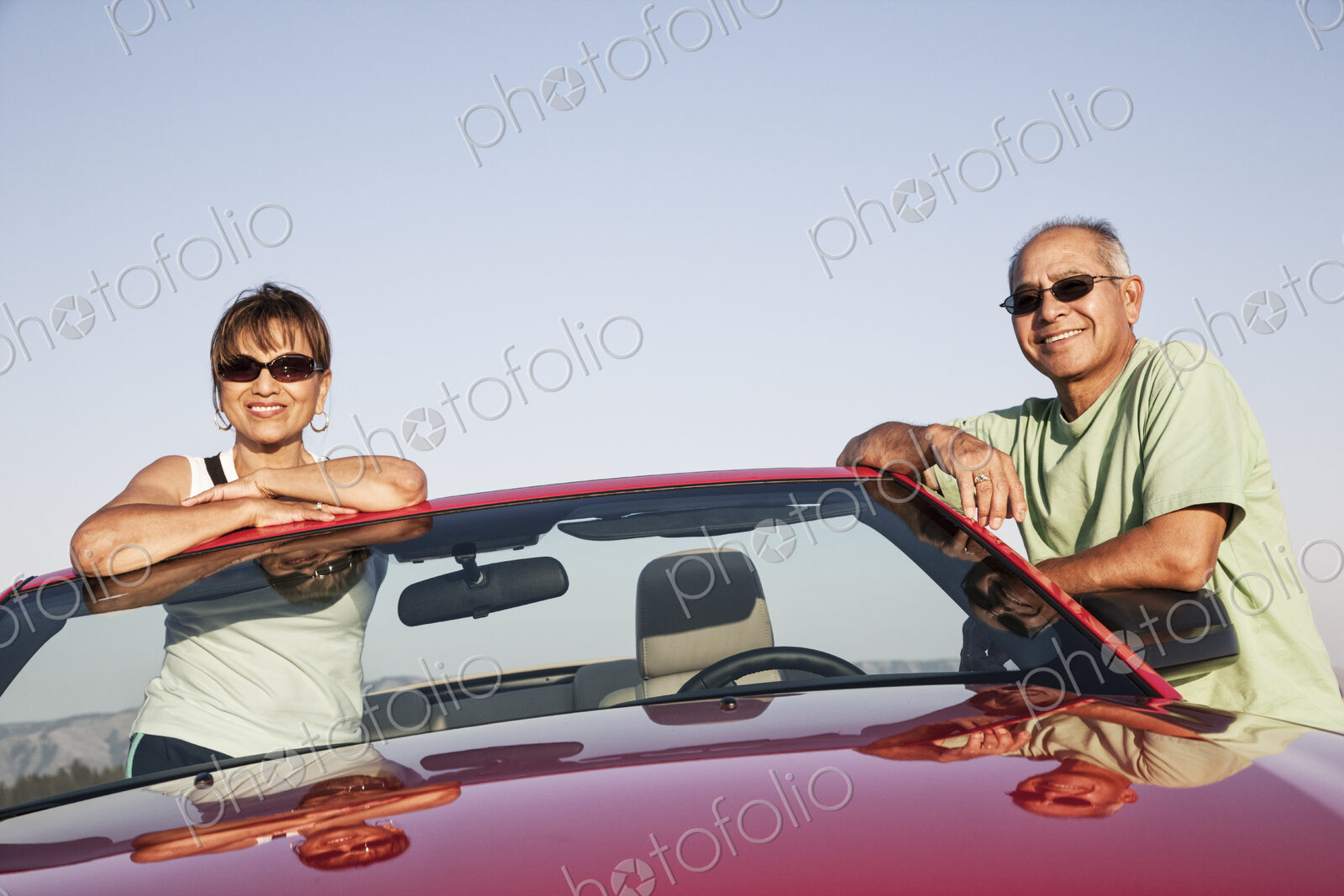A hip senior Hispanic couple on a road trip in eastern Washington State, USA.
