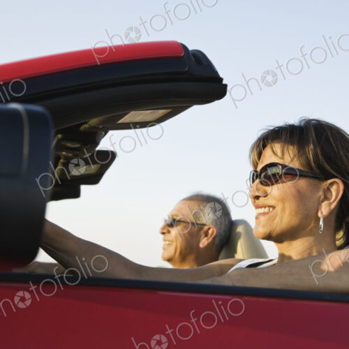 A hip senior Hispanic couple on a road trip in eastern Washington State, USA.