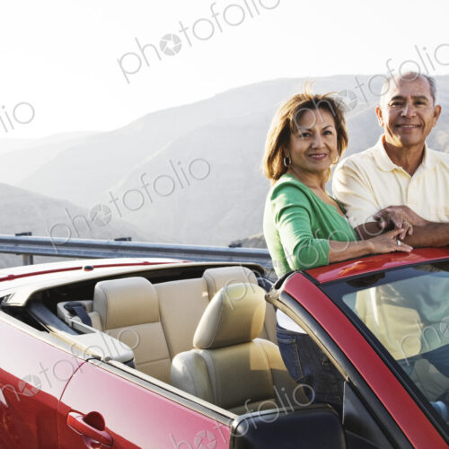 A hip senior Hispanic couple on a road trip in eastern Washington State, USA.