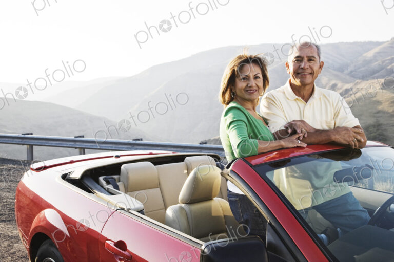 A hip senior Hispanic couple on a road trip in eastern Washington State, USA.