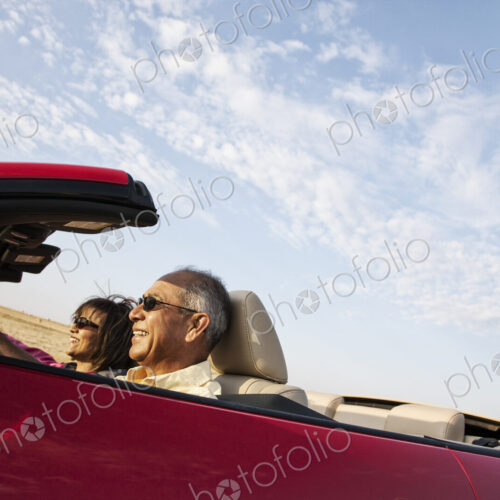 A hip senior Hispanic couple on a road trip in eastern Washington State, USA.