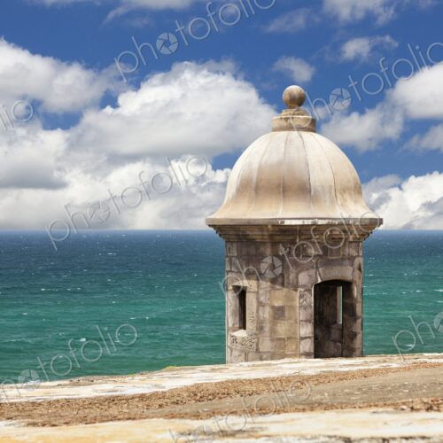A historic stone sentry box stands watch over the Atlantic Ocean at Castillo San… A historic stone sentry box stands watch over the Atlantic Ocean at Castillo San…