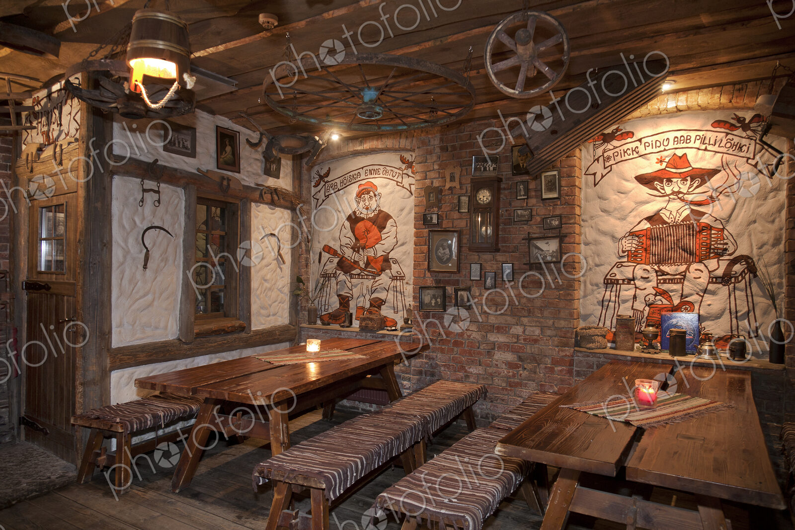 A hotel bar with old fashioned retro styled rooms, and rustic objects.