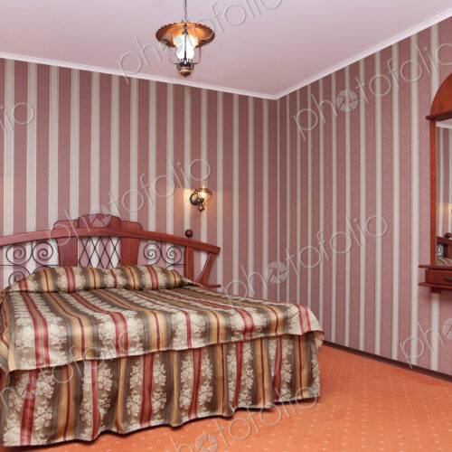 A hotel bedroom with a vintage look A hotel bedroom with a vintage look
