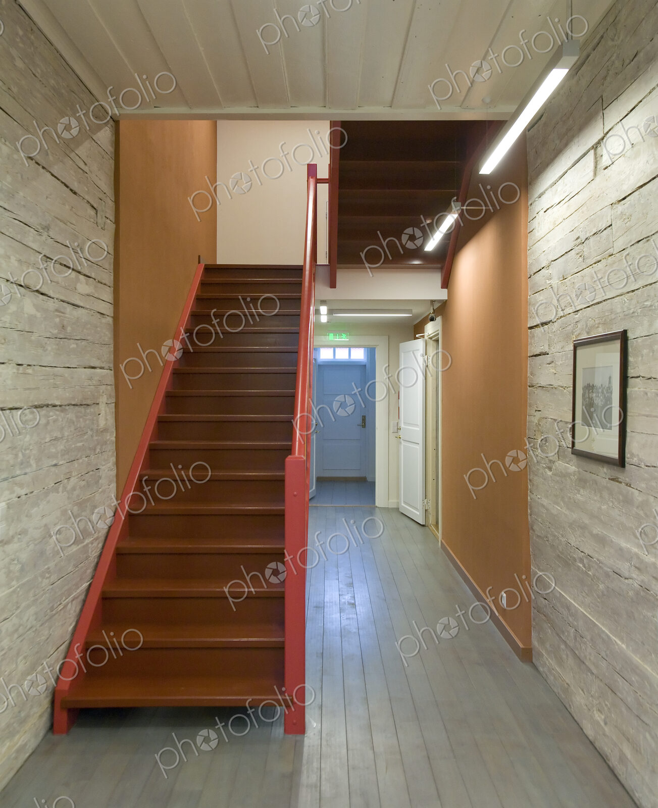 A hotel with old fashioned retro styled rooms, and rustic objects.