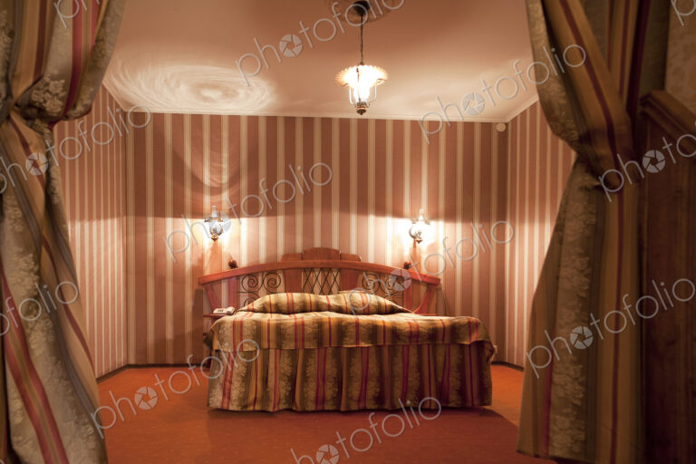 A hotel with old fashioned retro styled rooms, and rustic objects.