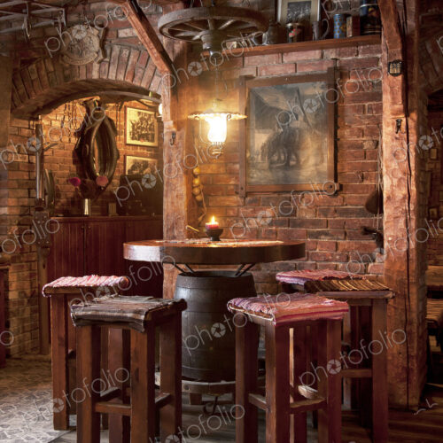 A hotel with old fashioned retro styled rooms, and rustic objects, bar table and stools. A hotel with old fashioned retro styled rooms, and rustic objects, bar table and stools.