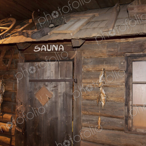 A hotel with old fashioned retro styled rooms and rustic objects, door to the sauna. A hotel with old fashioned retro styled rooms and rustic objects, door to the sauna.