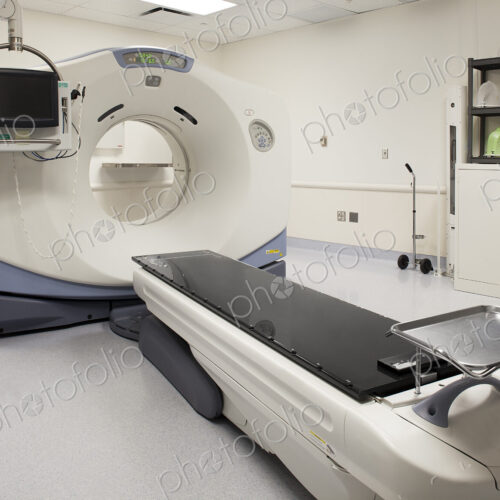 A large MRI magnetic resonance imaging scanner,with a patient bed.