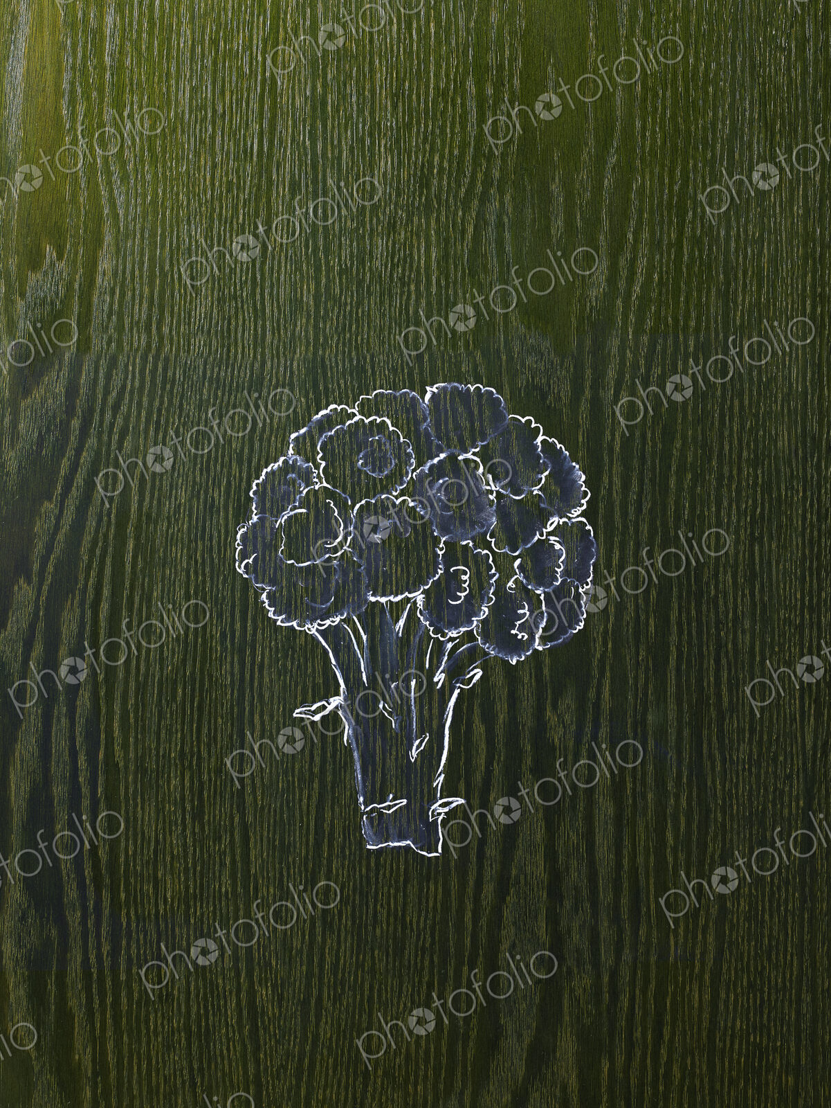 A line drawing image on a natural wood grain background. A head of broccoli, florets…