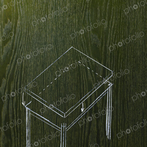 A line drawing image on a natural wood grain background. A rectangular table with a… A line drawing image on a natural wood grain background. A rectangular table with a…