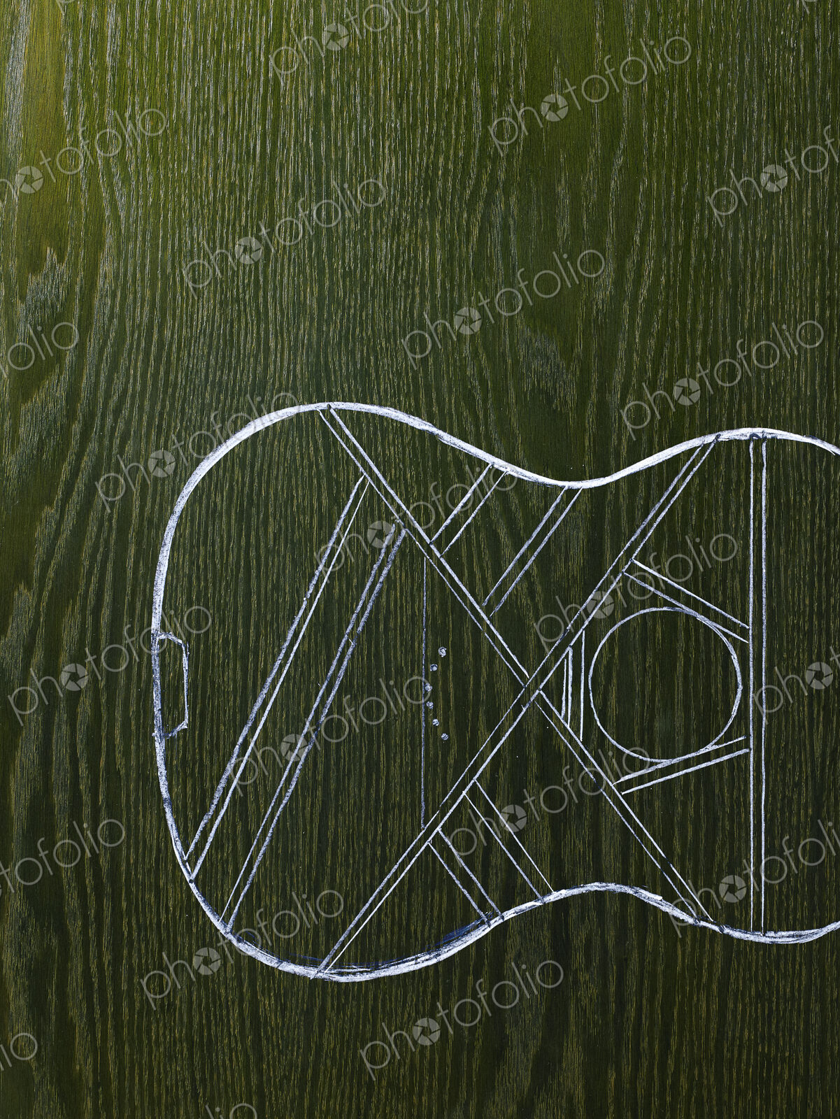 A line drawing image on a natural wood grain background. The sound board and body of a…