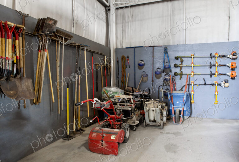 A maintenance shed at an airport, toolshed, tools and objects stored.