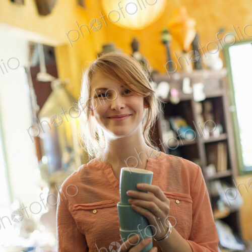 A man and woman, a couple running a business. An antique store. A man and woman, a couple running a business. An antique store.
