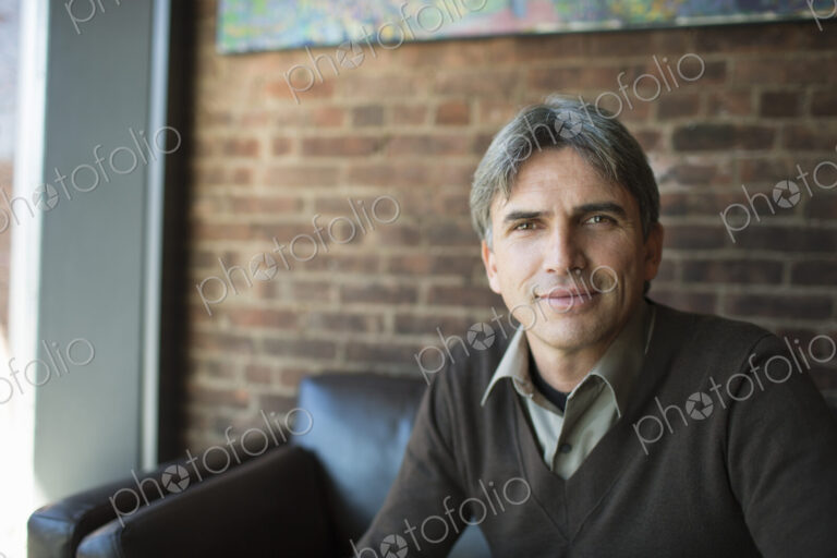 A man sitting in a coffee shop.
