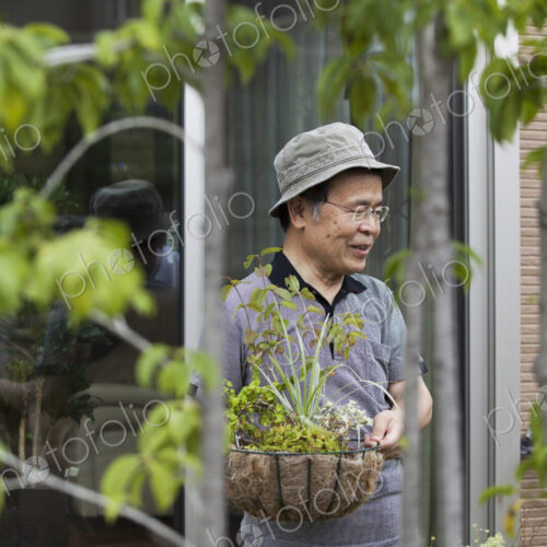 A man standing in his garden.