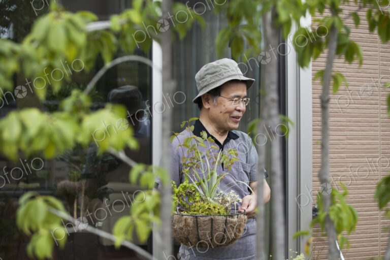 A man standing in his garden.