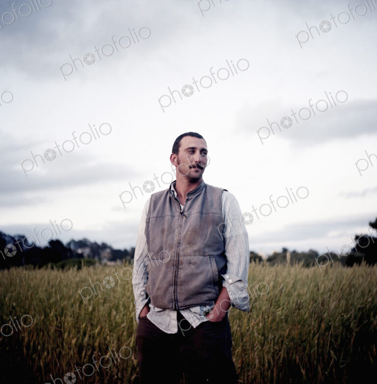 A man standing in the field at the social care and work project, the Homeless Garden…